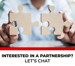 Person holding puzzle pieces representing partnership