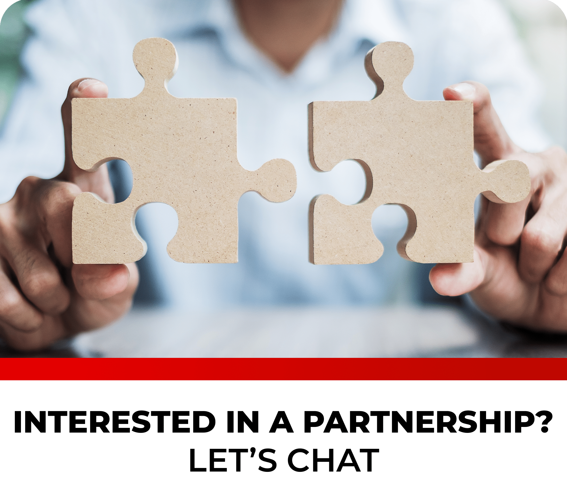 Person holding puzzle pieces representing partnership